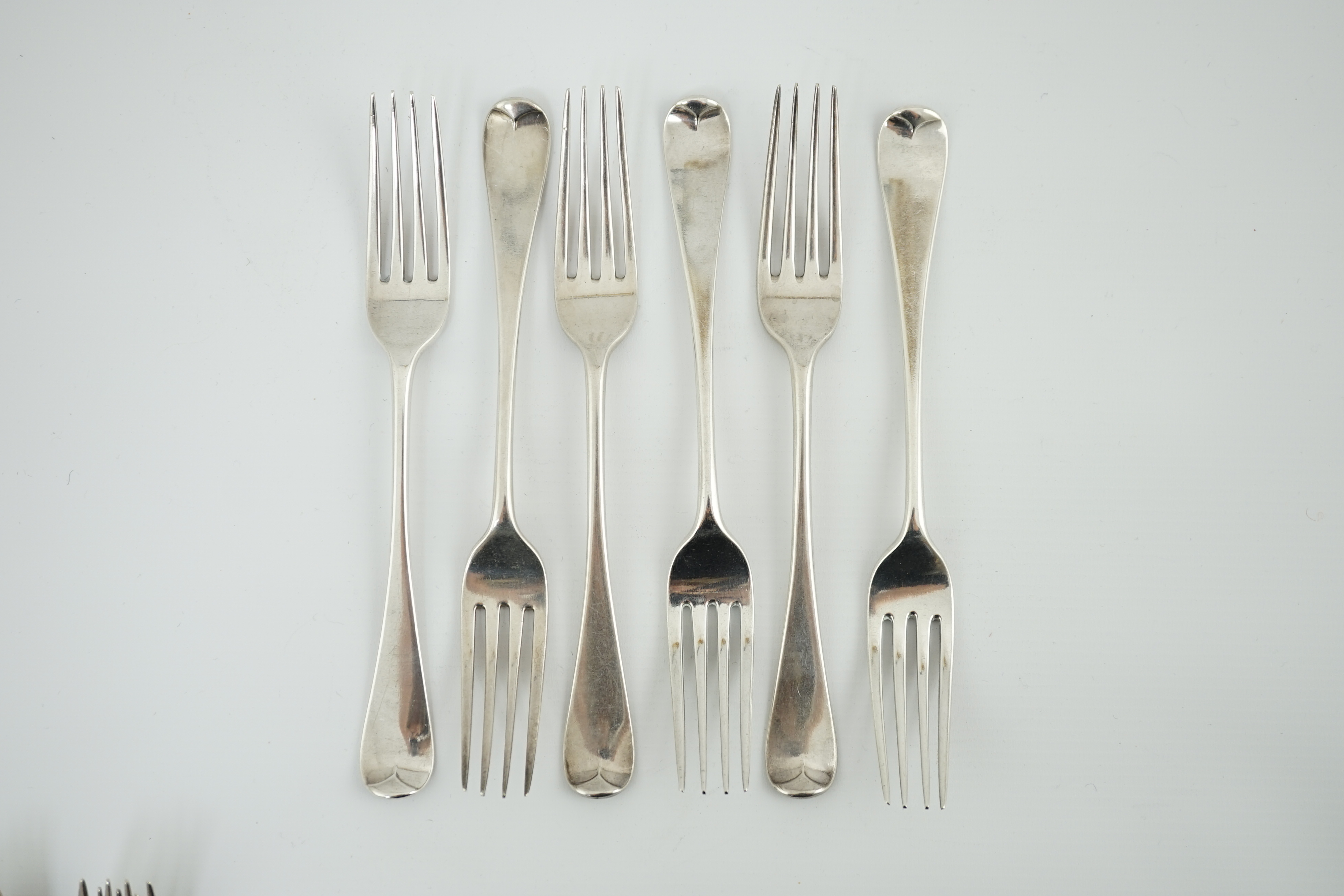 A set of twelve early Victorian silver Hanovarian pattern table forks by George Adams